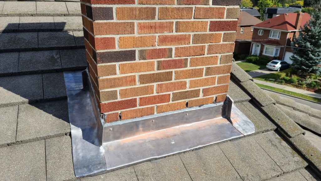 chimney re flashed on a marley tile roof repair.